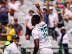 Kagiso Rabada has become the fastest to reach 350 Test wickets.(AP Photo/Halden Krog)
