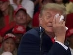 Donald Trump paused during a Daytona Beach rally to wipe his eye with a wet napkin, then resumed speaking.