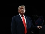 Trump’s Florida campaign rally was briefly disrupted when a man in the audience shouted. 