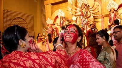 Durga Puja celebrations at CR Park, in New Delhi. (PTI) Durga Puja celebrations at CR Park, in New Delhi. (PTI)