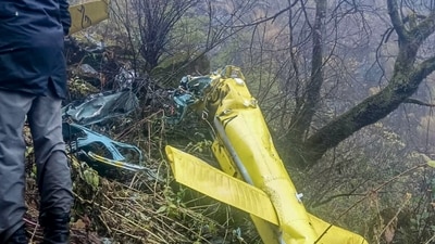 Wreckage of a private helicopter operated by Trans Bharat Aviation lying on a hillside near Chai village in the Joshimath area of Chamoli district, Uttarakhand. (PTI) Wreckage of a private helicopter operated by Trans Bharat Aviation lying on a hillside near Chai village in the Joshimath area of Chamoli district, Uttarakhand. (PTI)