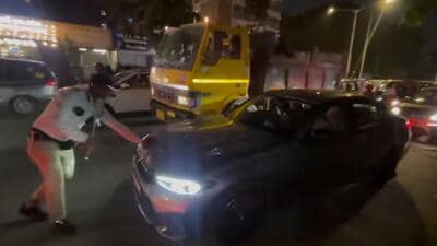 Woman held for trying to run over constable after Vile Parle crash. Woman held for trying to run over constable after Vile Parle crash.