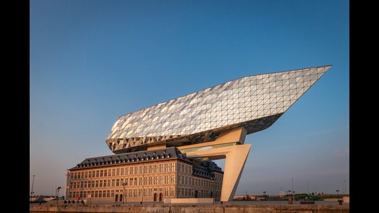 Residents say the extension to Antwerp’s port house, likened by its architects to a “diamond bow”, contrasts brutally with the low-rise brick-and-stone structures of the neighbourhood. (Adobestock)