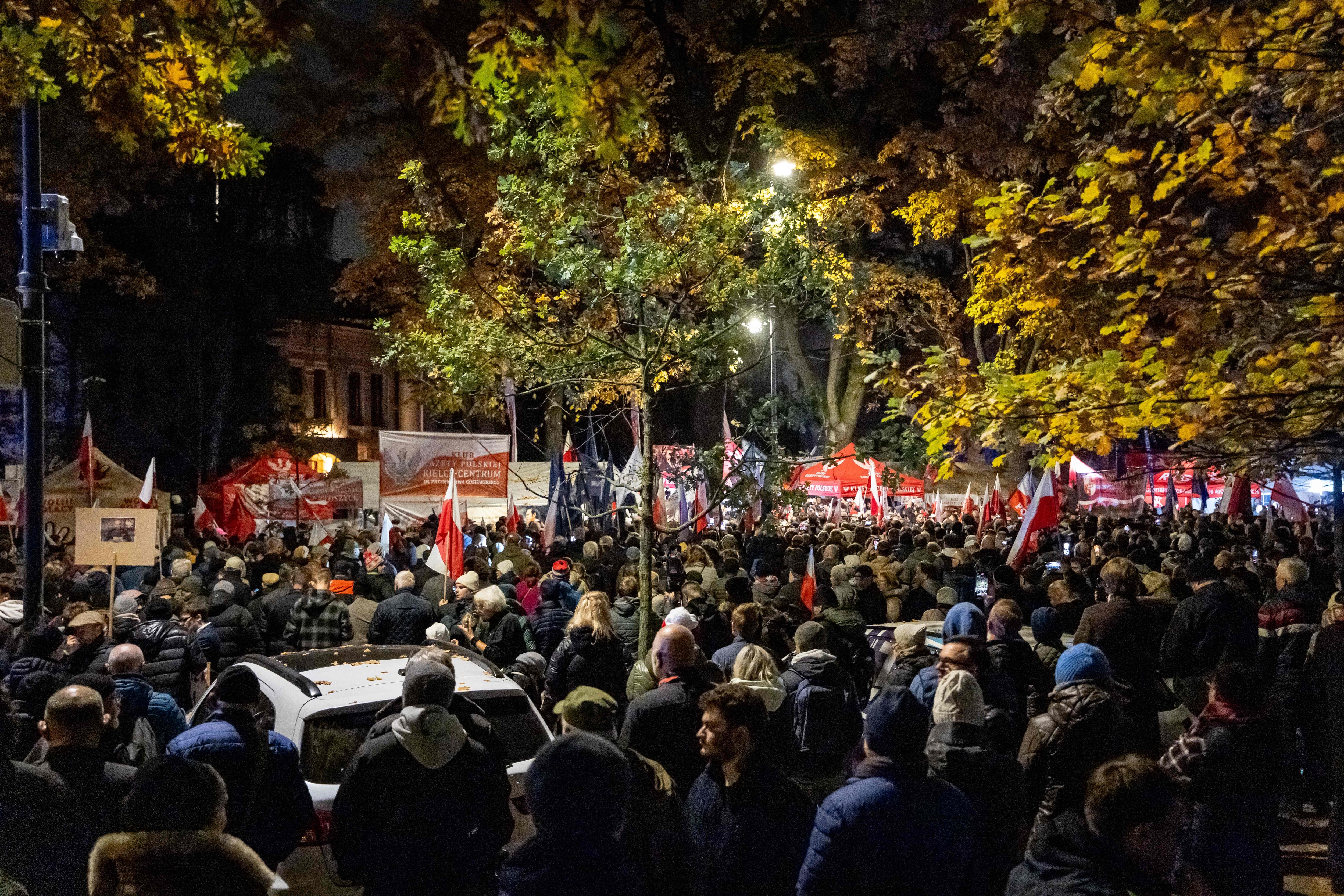 Protesters gather outside the headquarters of Poland's Constitutional Court after police blocked access to the building in Warsaw. (AFP) Protesters gather outside the headquarters of Poland's Constitutional Court after police blocked access to the building in Warsaw. (AFP)