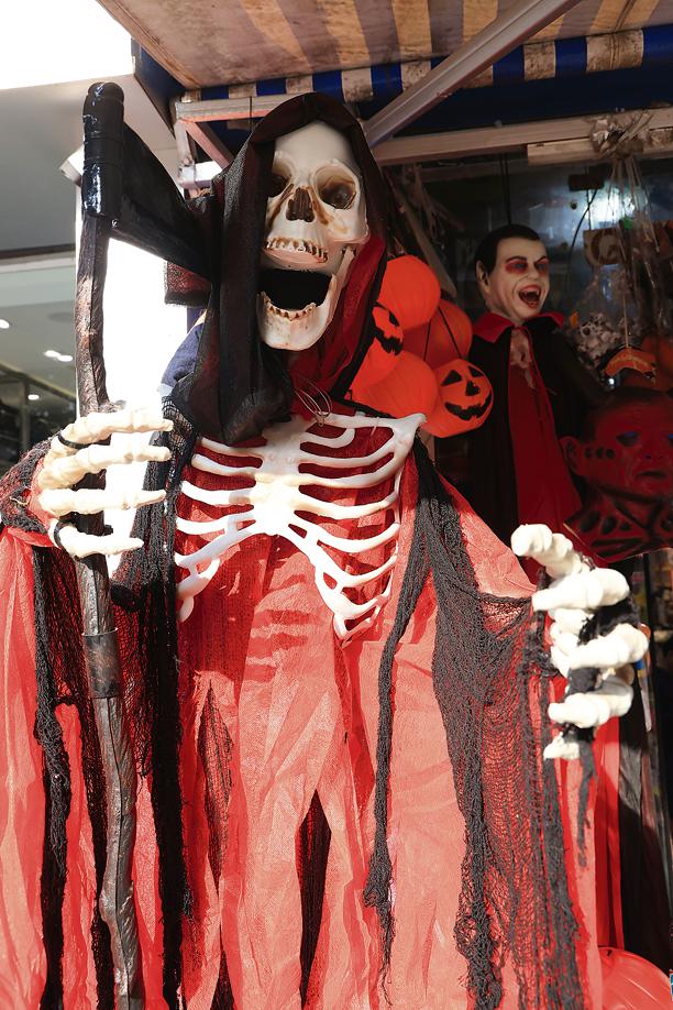 The sound-responsive Grim Reapers (here and extreme right) bring haunted-house drama at a snap. Price: ₹6,000 The sound-responsive Grim Reapers (here and extreme right) bring haunted-house drama at a snap. Price: ₹6,000